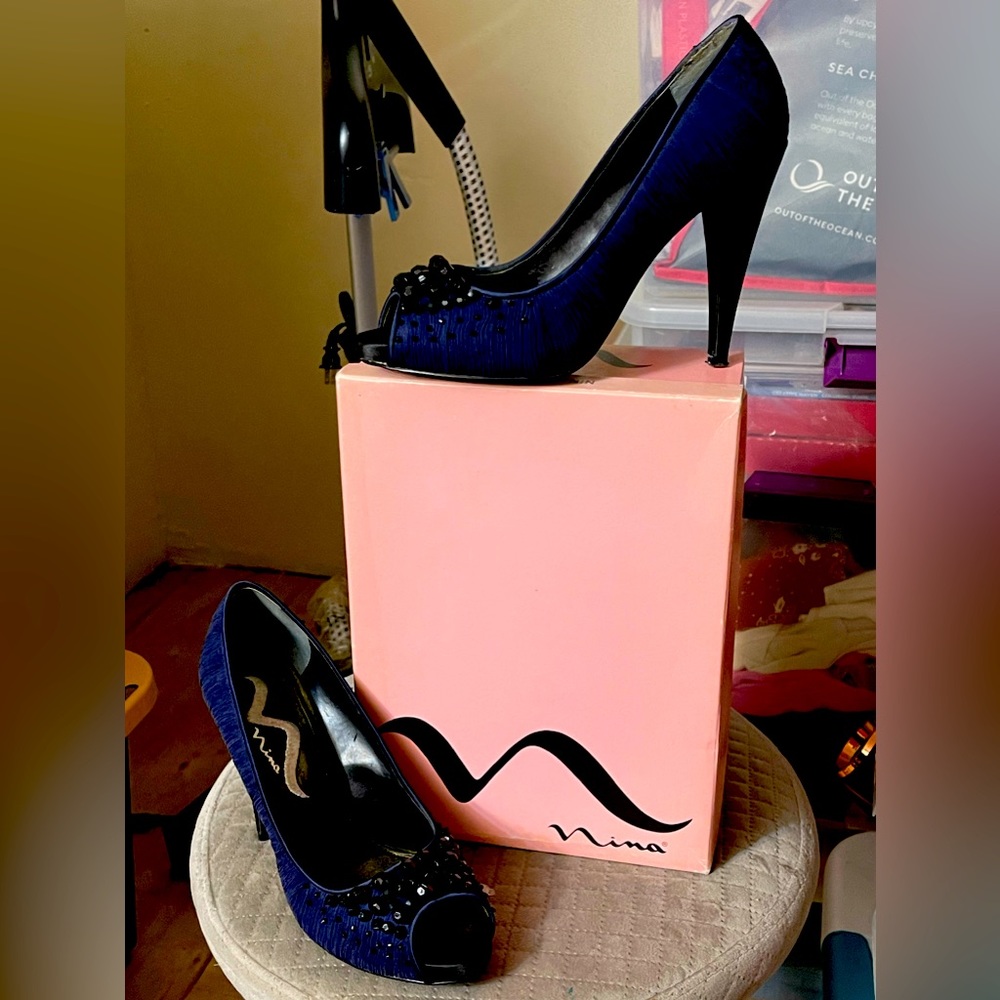 Blue chiffon draped peep-toe jewel embellished heel.
